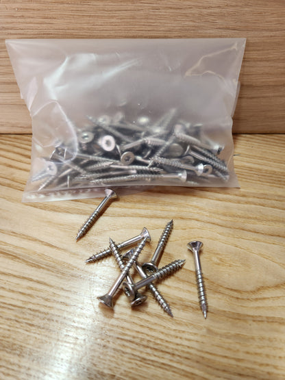 Bag of screws on a wooden surface