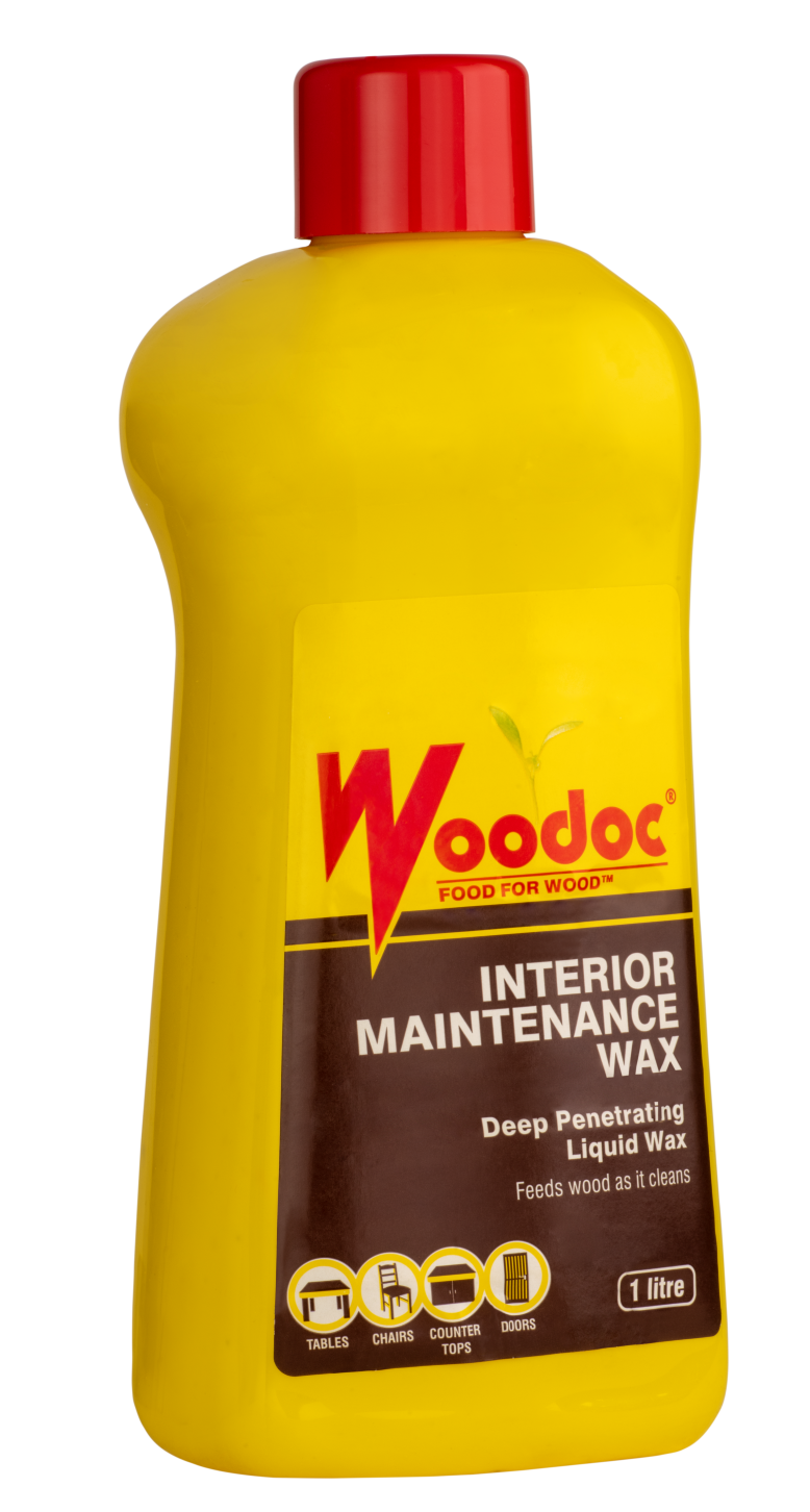 Yellow bottle of Woodoc interior maintenance wax with a red cap on a white background