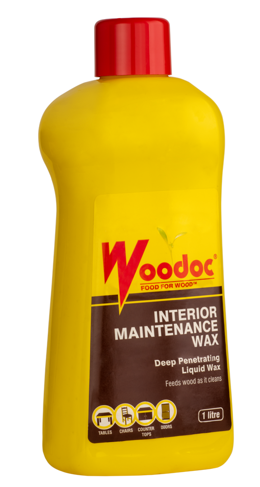 Yellow bottle of Woodoc interior maintenance wax with a red cap on a white background