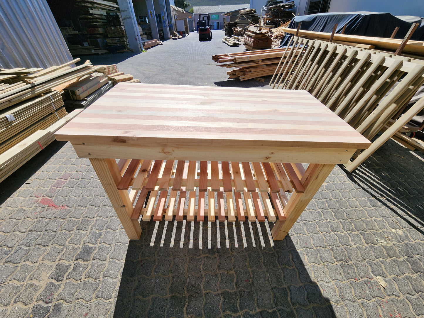 Wooden table with a shelf 